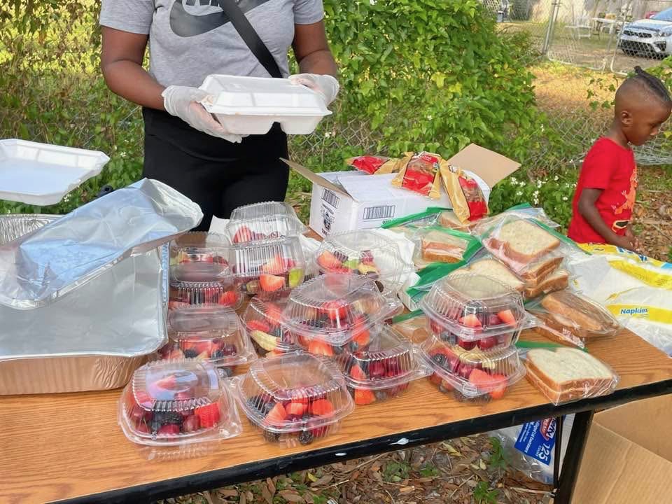 Fresh fruit and sandwiches ready to hand out